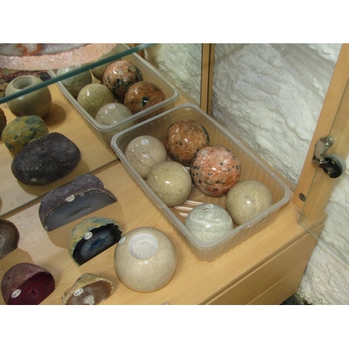 536 - MINERAL GEODES, 7 assorted mineral geodes, together with a stone candle holder and polished stone ba... 