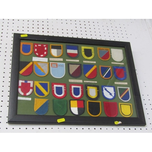 551 - FRAMED MEDALS/BADGES, 2 sets of reproduction medals in frames, together with 2 framed sets of cloth ... 