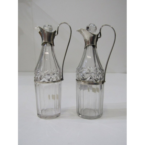 559 - SILVER MOUNTED OIL BOTTLES, pair of Georgian oil bottles with silver mounted tops and handles, HM, h... 