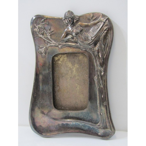 560 - PHOTO FRAMES, a small photo frame with silver mount, together with a brass framed example and an Art... 