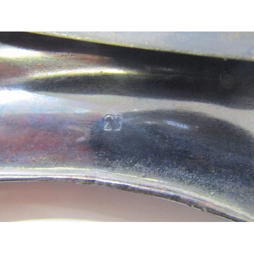 560 - PHOTO FRAMES, a small photo frame with silver mount, together with a brass framed example and an Art... 