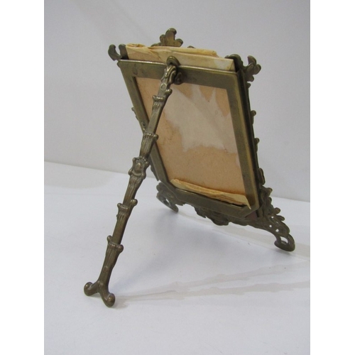 560 - PHOTO FRAMES, a small photo frame with silver mount, together with a brass framed example and an Art... 