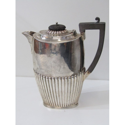 562 - SILVER COFFEE POT, a silver water jug with half fluted design, ebony handle and finial. Birmingham H... 