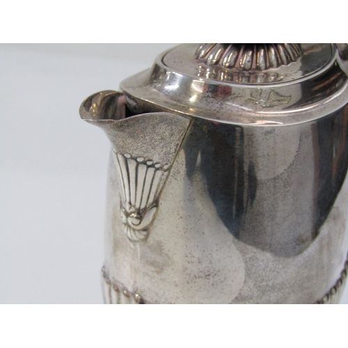 562 - SILVER COFFEE POT, a silver water jug with half fluted design, ebony handle and finial. Birmingham H... 
