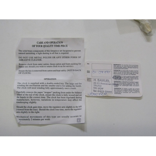 565 - CARRIAGE CLOCK, modern carriage clock with white painted dial by Jens Olsen, together with original ... 