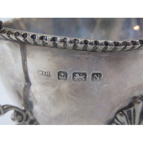 568 - SILVER GRAVY BOAT, silver gravy boat on 3 ornate padded feet, Birmingham HM, 139 grams