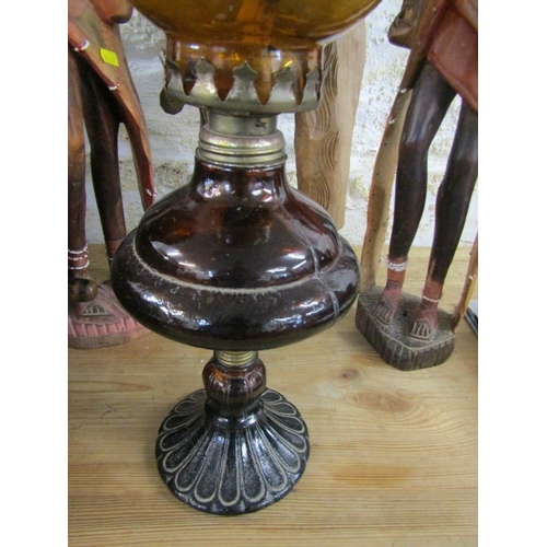 600 - WOOD CARVINGS, 2 native wood carvings, together with a Thoughtful Man and an oil lamp