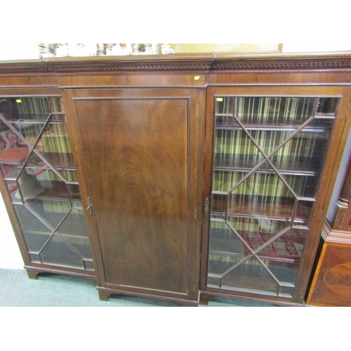 824 - MAHOGANY BREAKFRONT BOOKCASE, with pair of Chippendale design glazed side doors, 138cm height, 184cm... 