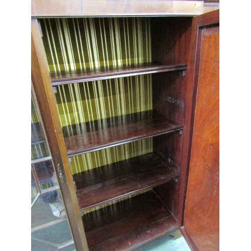 824 - MAHOGANY BREAKFRONT BOOKCASE, with pair of Chippendale design glazed side doors, 138cm height, 184cm... 