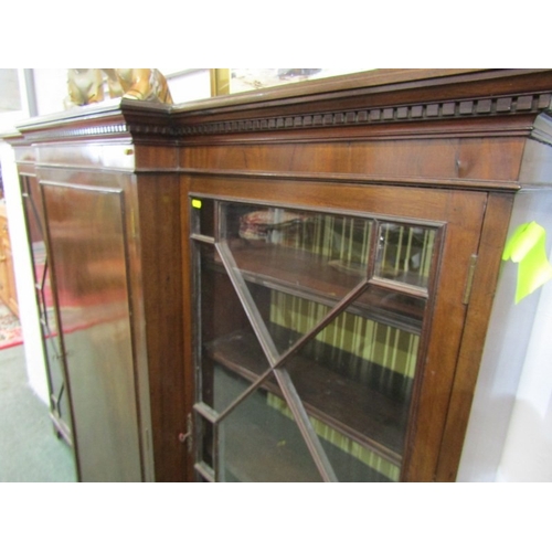 824 - MAHOGANY BREAKFRONT BOOKCASE, with pair of Chippendale design glazed side doors, 138cm height, 184cm... 