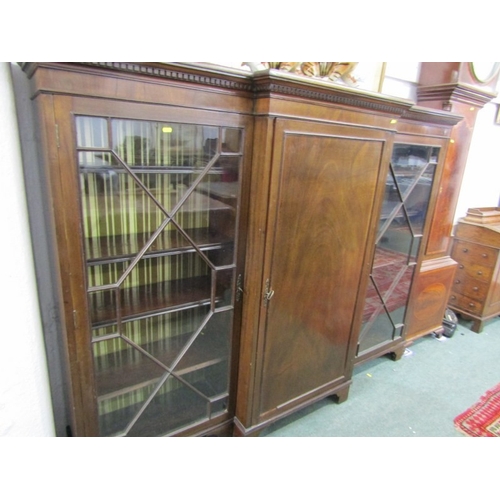 824 - MAHOGANY BREAKFRONT BOOKCASE, with pair of Chippendale design glazed side doors, 138cm height, 184cm... 