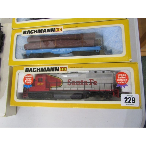 229 - BACHMANN HO SERIES, crane car and boom tender, 89 tri level car transporter with 15 autos, Bud and t... 