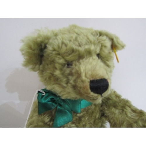 STEIFF TEDDY BEAR, Golden plush Steiff teddy bear with green ribbon ...