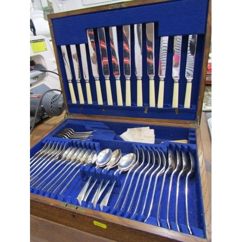 629 - CANTEEN OF CUTLERY, a canteen of silver plated cutlery contained in an oak case (49 pieces)