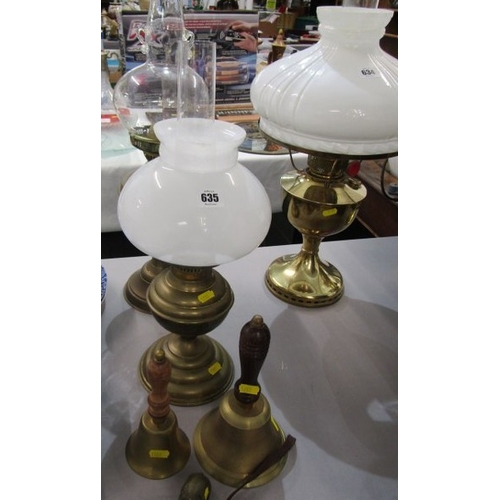 635 - OIL LAMPS, 2 brass oil lamps together with a brass elephant & 2 brass & wooden handled hand bells