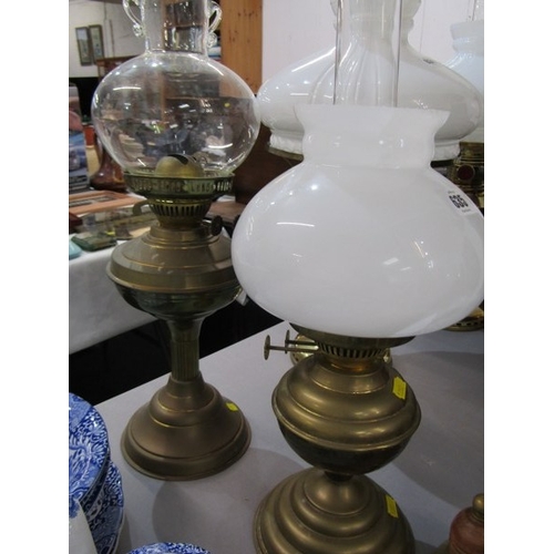 635 - OIL LAMPS, 2 brass oil lamps together with a brass elephant & 2 brass & wooden handled hand bells