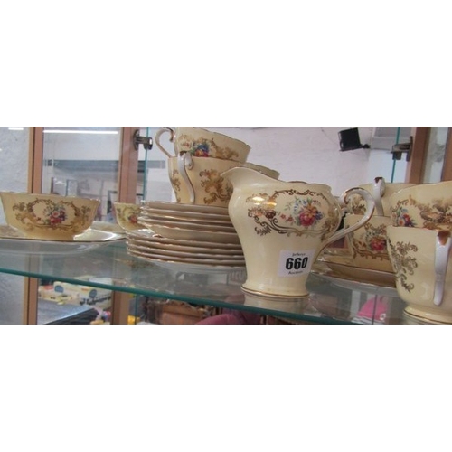660 - TEA SET, an Aynsley bone china tea service consisting of milk jug, sugar bowl, 6 trio's and a sandwi... 