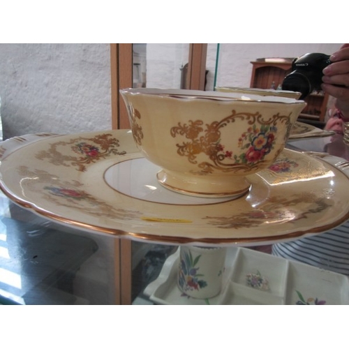 660 - TEA SET, an Aynsley bone china tea service consisting of milk jug, sugar bowl, 6 trio's and a sandwi... 