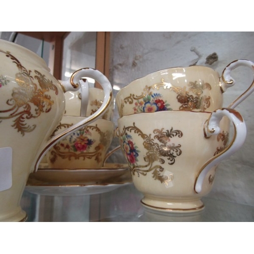 660 - TEA SET, an Aynsley bone china tea service consisting of milk jug, sugar bowl, 6 trio's and a sandwi... 