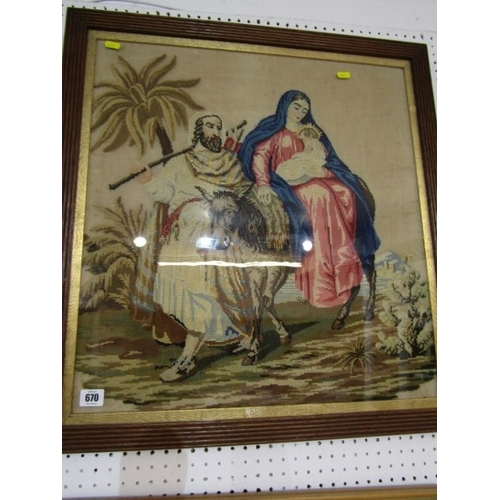 670 - TAPESTRY, an oak framed tapestry picture depicting Joseph and Mary with the baby Jesus, 65cm wide