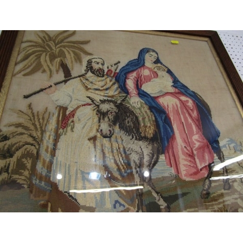 670 - TAPESTRY, an oak framed tapestry picture depicting Joseph and Mary with the baby Jesus, 65cm wide