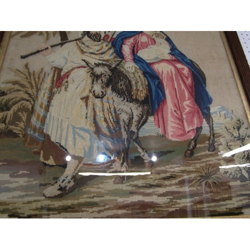 670 - TAPESTRY, an oak framed tapestry picture depicting Joseph and Mary with the baby Jesus, 65cm wide