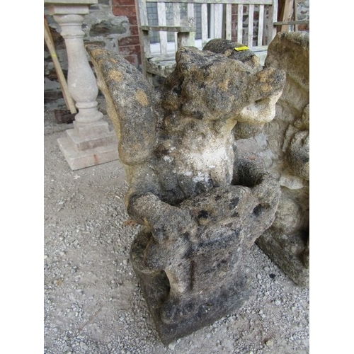 681 - STONEWORK GRIFFINS, pair of stonework griffin finials, 52cm height