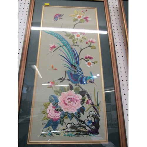 691 - ORIENTAL TAPESTRY, a pair of floral and bird decorated oriental influenced tapestry pictures