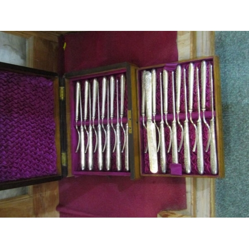 714 - BOXED CUTLERY, an oak cased box containing a set of 12 knives and 12 matching forks, 19th century