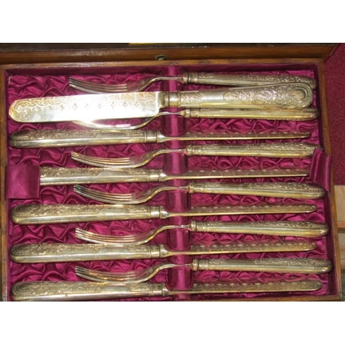 714 - BOXED CUTLERY, an oak cased box containing a set of 12 knives and 12 matching forks, 19th century
