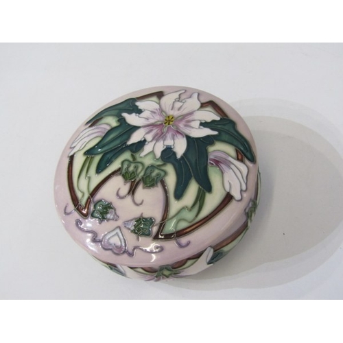 718 - MOORCROFT POTTERY, a Moorcroft trial piece pot and cover, florally decorated together with a green f... 