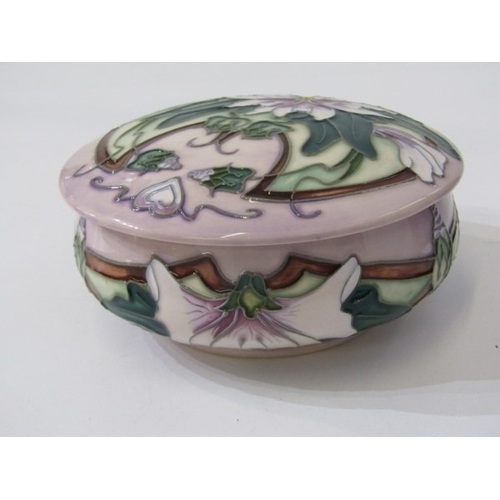 718 - MOORCROFT POTTERY, a Moorcroft trial piece pot and cover, florally decorated together with a green f... 