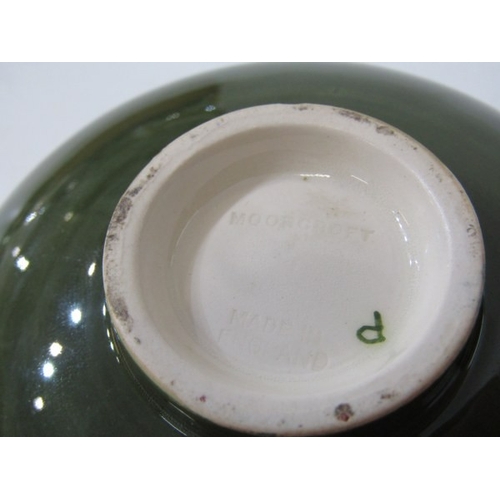 718 - MOORCROFT POTTERY, a Moorcroft trial piece pot and cover, florally decorated together with a green f... 