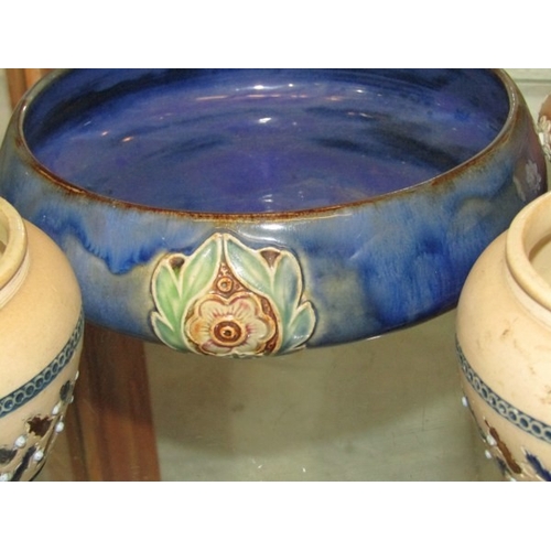 746 - ROYAL DOULTON, blue and floral motif fruit bowl, together with a brown and white embossed Doulton si... 