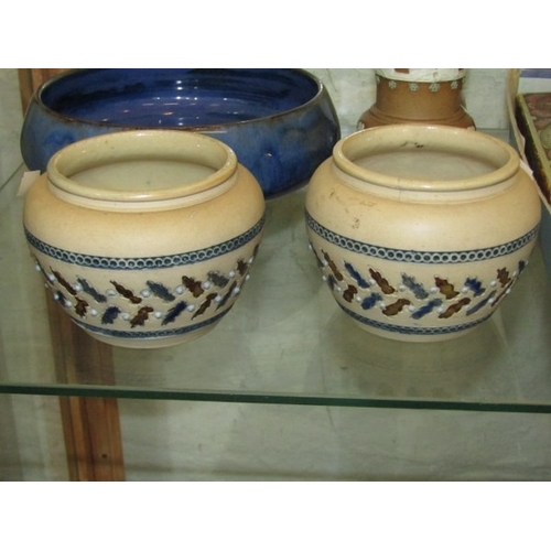 746 - ROYAL DOULTON, blue and floral motif fruit bowl, together with a brown and white embossed Doulton si... 