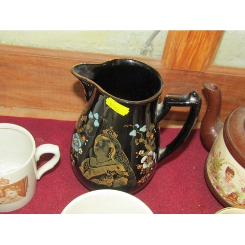 752 - COMMEMORATIVE WARE, a Jackfield pottery, Queen Victoria commemorative jug, together with various oth... 
