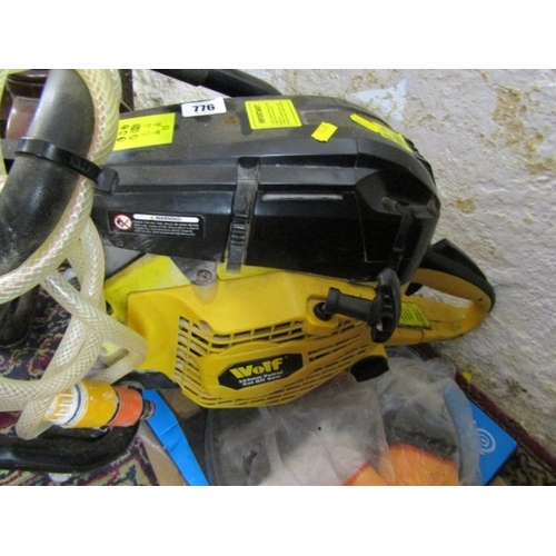 776 - TOOLS, a Wolf 305 MM petrol cut off saw, with accessories and instructions
