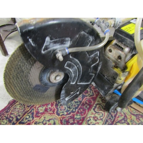 776 - TOOLS, a Wolf 305 MM petrol cut off saw, with accessories and instructions