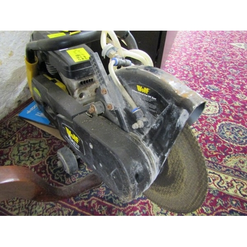 776 - TOOLS, a Wolf 305 MM petrol cut off saw, with accessories and instructions