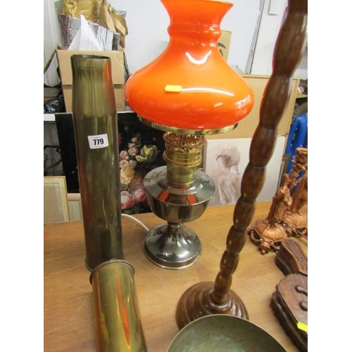 779 - BRASS SHELL CASE, a wartime brass shell case, 44cm height, together with another, a modern oil lamp ... 