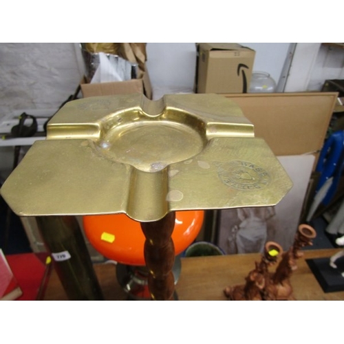 779 - BRASS SHELL CASE, a wartime brass shell case, 44cm height, together with another, a modern oil lamp ... 