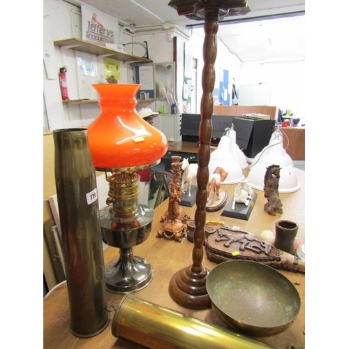 779 - BRASS SHELL CASE, a wartime brass shell case, 44cm height, together with another, a modern oil lamp ... 