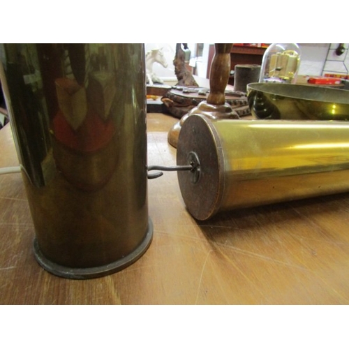 779 - BRASS SHELL CASE, a wartime brass shell case, 44cm height, together with another, a modern oil lamp ... 