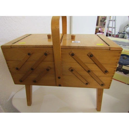 785 - MID CENTURY CANTILEVER SEWING BOXES, 2 wooden cantilever sewing boxes, one on 4 legs, with various c... 