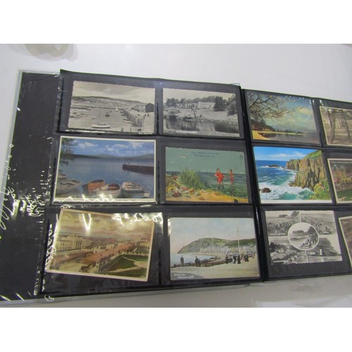 555 - POSTCARDS, a modern collectors album containing a quantity of Edwardian and later; topographical, gr... 
