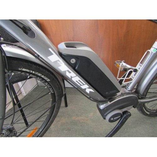 825 - ELECTRIC BIKE, a Shimano Trek electric bike with built in lights, puncture proof tyres, with Bosch c... 