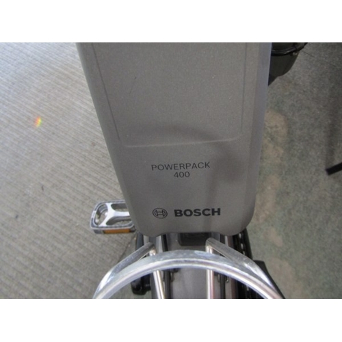 825 - ELECTRIC BIKE, a Shimano Trek electric bike with built in lights, puncture proof tyres, with Bosch c... 