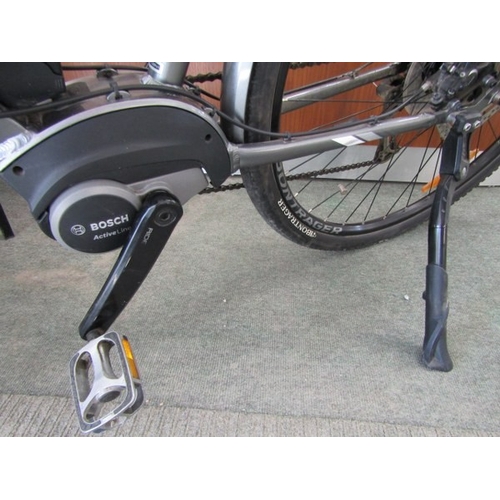 825 - ELECTRIC BIKE, a Shimano Trek electric bike with built in lights, puncture proof tyres, with Bosch c... 