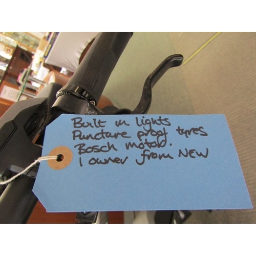 825 - ELECTRIC BIKE, a Shimano Trek electric bike with built in lights, puncture proof tyres, with Bosch c... 