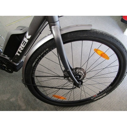 825 - ELECTRIC BIKE, a Shimano Trek electric bike with built in lights, puncture proof tyres, with Bosch c... 